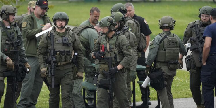 Manhunt for Minnesota gunman continues for second day