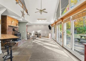 Earth-Sheltered Hobbit Home That Appears To Sink Into the Ground in Massachusetts Is Listed for Just $450K