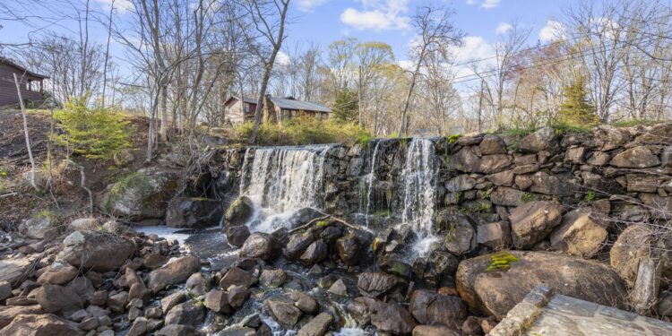 Historic Connecticut Sawmill With Its Own Private Waterfall Hits the Market for $1.75 Million After Being Transformed Into Fairy-Tale Retreat