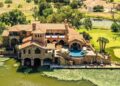 Dramatic Stone Villa Perched on the Edge of Horseshoe Bay Comes With Boat-In, Boat-Out Access