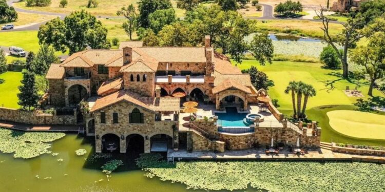 Dramatic Stone Villa Perched on the Edge of Horseshoe Bay Comes With Boat-In, Boat-Out Access